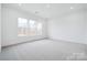 Spacious bedroom with carpeting and large windows at 5217 Glenwalk Dr # 0059, Charlotte, NC 28269