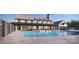 Resort-style pool with a large deck and lounge chairs at 5217 Glenwalk Dr # 0059, Charlotte, NC 28269