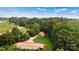 Secluded home nestled among lush trees, boasting a private driveway and a spacious outbuilding at 6051 Pointe West Ln, Vale, NC 28168