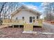 Charming home with a wooden deck, perfect for outdoor relaxation and enjoying the surrounding nature at 6051 Pointe West Ln, Vale, NC 28168
