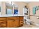 Spacious bathroom featuring a double vanity, tile flooring, and modern toilet at 6051 Pointe West Ln, Vale, NC 28168