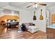 Cozy bedroom retreat featuring guitars and a seating area, with a relaxing bed in the background at 6051 Pointe West Ln, Vale, NC 28168