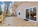 Spacious wooden deck with seating, offering a great outdoor space for relaxing and entertaining guests at 6051 Pointe West Ln, Vale, NC 28168