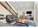 Bright living room with comfortable seating, hardwood floors, and modern decor at 6051 Pointe West Ln, Vale, NC 28168