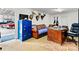 Office space featuring deer mounts, a leather couch, and a blue filing cabinet for a unique aesthetic at 6051 Pointe West Ln, Vale, NC 28168