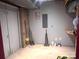 Unfinished basement with painted walls, storage, and utility access at 2535 Fairfax Dr, Gastonia, NC 28054