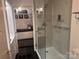 This remodeled bathroom boasts a stand up glass enclosed shower and ample storage at 2535 Fairfax Dr, Gastonia, NC 28054