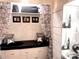 A walk in closet with built in bench, drawers, and decorative accents at 2535 Fairfax Dr, Gastonia, NC 28054