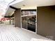 Wide wooden deck with sliding glass doors and exterior access at 2535 Fairfax Dr, Gastonia, NC 28054