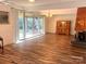 Living room filled with natural light and featuring a wooden china cabinet and fireplace at 2535 Fairfax Dr, Gastonia, NC 28054