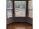 Sunlit bay window area with hardwood floors and detailed trim work at 1491 Hwy 160 E Rd, Fort Mill, SC 29715