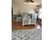 Cozy bedroom with wood floors, two-tone paint, and natural light at 1491 Hwy 160 E Rd, Fort Mill, SC 29715