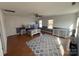 Spacious primary bedroom featuring hardwood floors, ensuite, and a walk-in closet at 1491 Hwy 160 E Rd, Fort Mill, SC 29715