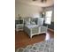 Cozy bedroom with a neutral color scheme and light wood flooring for a peaceful retreat at 1491 Hwy 160 E Rd, Fort Mill, SC 29715