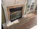 Charming fireplace with decorative mantel and tile surround, next to French doors at 1491 Hwy 160 E Rd, Fort Mill, SC 29715