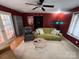 The living room has hardwood floors, a sofa, a ceiling fan, and a modern style at 1491 Hwy 160 E Rd, Fort Mill, SC 29715