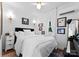 Cozy bedroom with comfortable bed and plenty of natural light at 4016 Nettie Ct, Charlotte, NC 28211