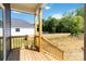 Spacious wooden deck with natural wood railings and view of the backyard at 213 Sheffield Dr, York, SC 29745