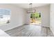 Bright dining room with sliding glass doors leading to a deck, with views of nature at 213 Sheffield Dr, York, SC 29745
