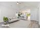 Staged living room with open concept design, seamlessly connected to the kitchen and filled with natural light at 213 Sheffield Dr, York, SC 29745