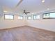 Finished basement with hardwood floors, recessed lighting and egress windows at 914 Laurel Creek Ln, Charlotte, NC 28211