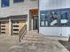 Close up of entryway with beautiful stone steps leading up to the front door at 914 Laurel Creek Ln, Charlotte, NC 28211
