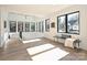 Bright hallway with hardwood floors and black-framed windows offering great views at 914 Laurel Creek Ln, Charlotte, NC 28211