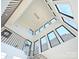 Contemporary staircase design featuring lots of natural light and a modern chandelier at 914 Laurel Creek Ln, Charlotte, NC 28211