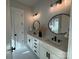 Modern bathroom with double vanity, sleek mirrors, and contemporary lighting fixtures at 4314 Morning Mist Dr # 15, Sherrills Ford, NC 28673