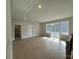 Spacious bonus room with wood flooring, natural light, and access to a private balcony at 4314 Morning Mist Dr # 15, Sherrills Ford, NC 28673
