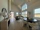 Bright living room with soaring ceilings, large windows, fireplace and stylish modern decor at 4314 Morning Mist Dr # 15, Sherrills Ford, NC 28673