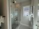 Bathroom featuring frameless glass shower, built-in bench, and neutral wall colors at 4314 Morning Mist Dr # 15, Sherrills Ford, NC 28673