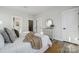 Bright bedroom featuring neutral walls, hardwood floors, and a comfortable layout at 1015 Kokomo Ln # 22, Charlotte, NC 28206