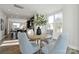 Inviting dining area with modern furniture, natural light, and an open connection to the kitchen at 1015 Kokomo Ln # 22, Charlotte, NC 28206