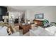 Open-concept living space with hardwood floors, modern decor, and plenty of natural light at 1015 Kokomo Ln # 22, Charlotte, NC 28206