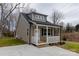 Recently built home with neutral siding and a covered porch at 317 Blackburn St, York, SC 29745