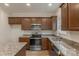 Updated kitchen featuring granite countertops and ample cabinetry at 317 Blackburn St, York, SC 29745