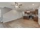 Spacious living room with an open kitchen and hardwood floors at 317 Blackburn St, York, SC 29745