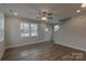 Bright living room with hardwood floors and neutral walls at 317 Blackburn St # 4, York, SC 29745