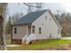 Tan vinyl sided home with a side entrance and steps at 317 Blackburn St, York, SC 29745