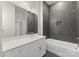 Modern bathroom with white vanity and grey tile shower at 179 Heartland Dr # 8, Rock Hill, SC 29732