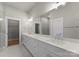 Modern bathroom with double vanity, large mirror and a walk in shower at 179 Heartland Dr # 8, Rock Hill, SC 29732