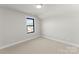 Cozy bedroom with carpet and a large window at 179 Heartland Dr # 8, Rock Hill, SC 29732