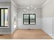 Bright dining room with chandelier and hardwood floors at 179 Heartland Dr # 8, Rock Hill, SC 29732