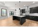 Modern kitchen with dark cabinetry and a large island at 179 Heartland Dr # 8, Rock Hill, SC 29732