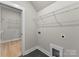 Laundry room with built-in shelving and washer/dryer hookups at 179 Heartland Dr # 8, Rock Hill, SC 29732
