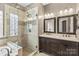 Bathroom with walk-in shower and double vanity at 286 Glencoe Ln, Mooresville, NC 28117