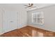 Bright bedroom with hardwood floors and double doors to closet at 286 Glencoe Ln, Mooresville, NC 28117