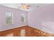Bedroom with hardwood floors and ceiling fan at 286 Glencoe Ln, Mooresville, NC 28117