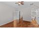 Hardwood floor bedroom with access to hallway and additional rooms at 286 Glencoe Ln, Mooresville, NC 28117